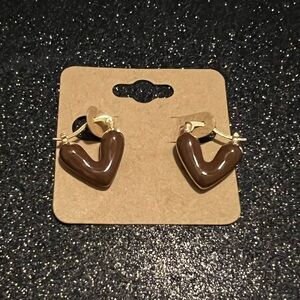 Women’s fashion jewelry. Lovely Heart Shaped Hoop Earrings